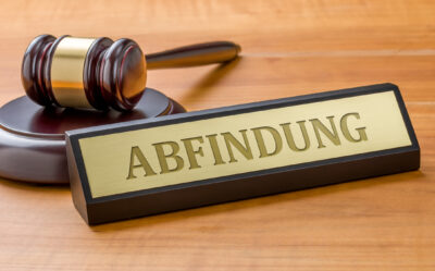 Schild mit Beschriftung Abfindung